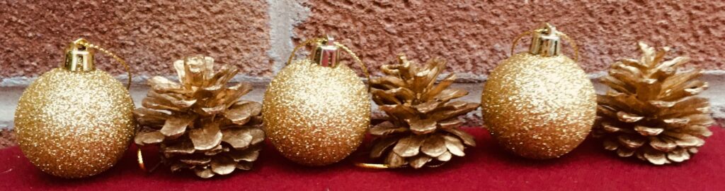christmas baubles and pine cones