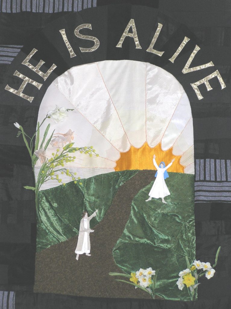 church banner with words He is alive